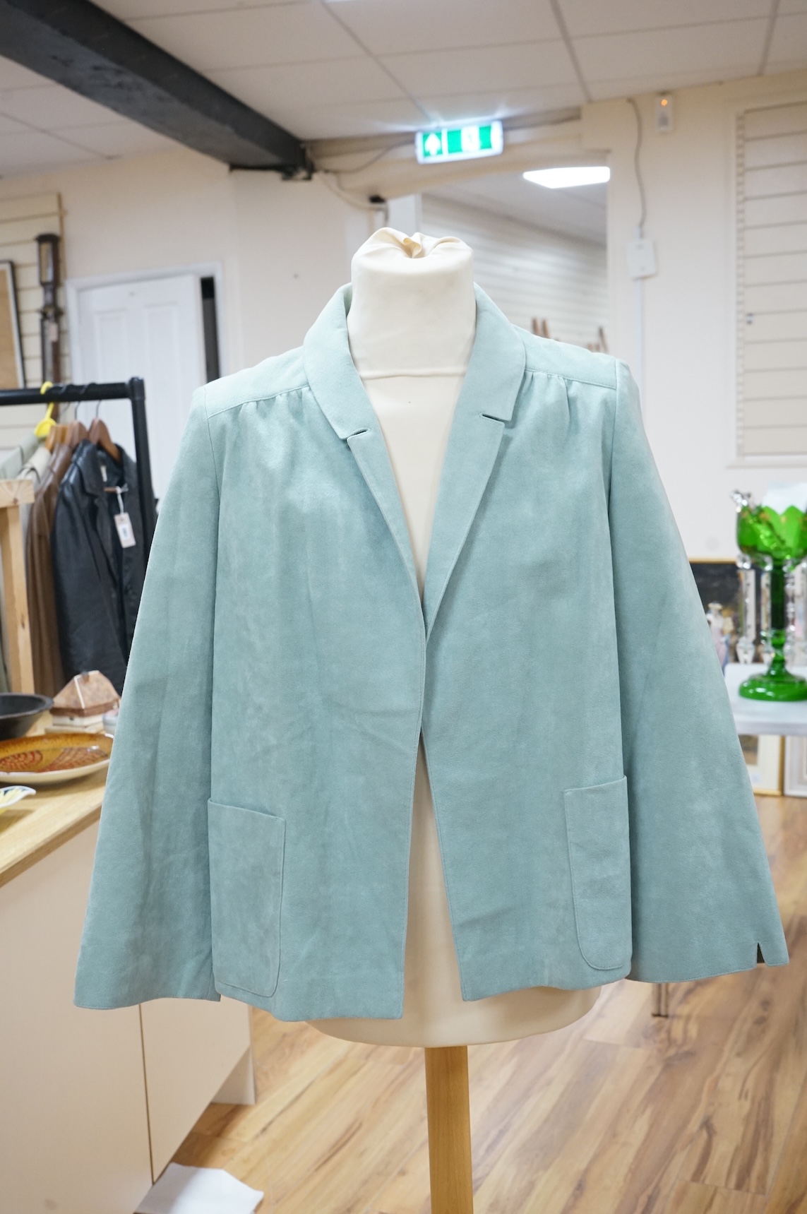 A Vera Maxwell navy blue suede jacket, a Vera Maxwell pistachio green jacket & skirt suit and a Cache d'Or jacket & skirt suit